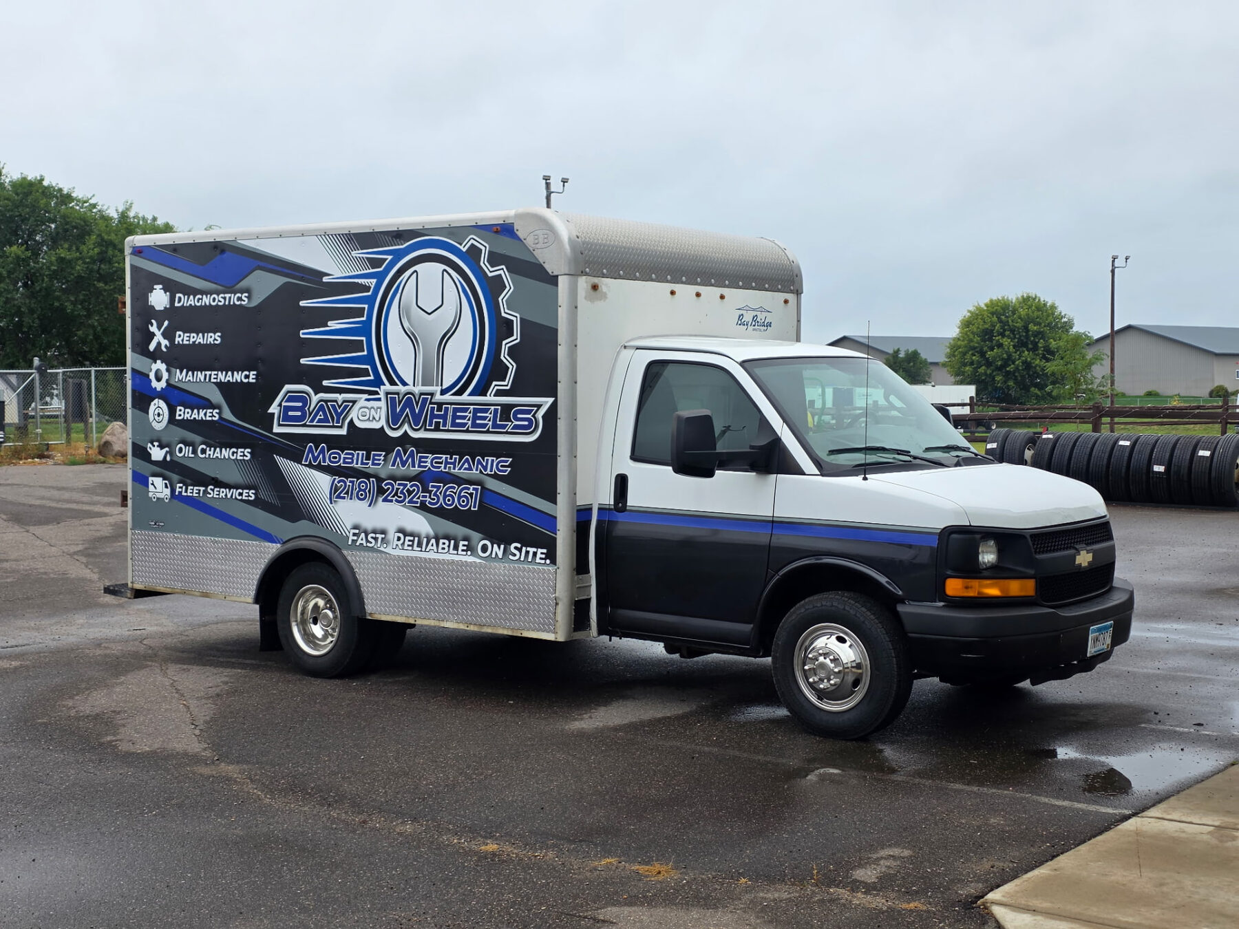 Bay On Wheels wrapped mobile mechanic service truck